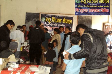 Families gathered at the medicine table during the camp