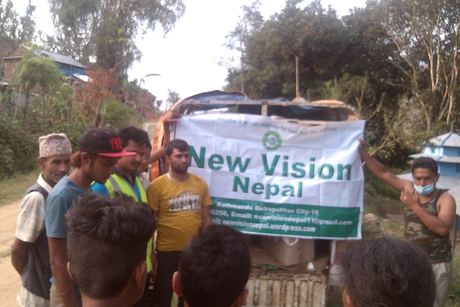 New Vision Nepal volunteers with relief supplies after the 2015 earthquake