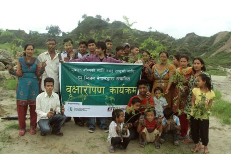 Volunteers planting trees on public land at Mulpani